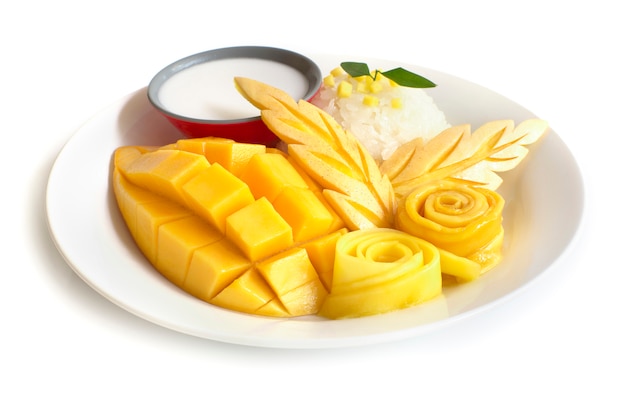 Thai dessert,mango with sticky rice sweet coconut milk  side view isolated on white background