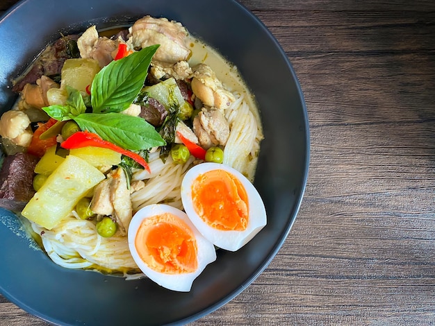 Thai food Green curry chicken on the table