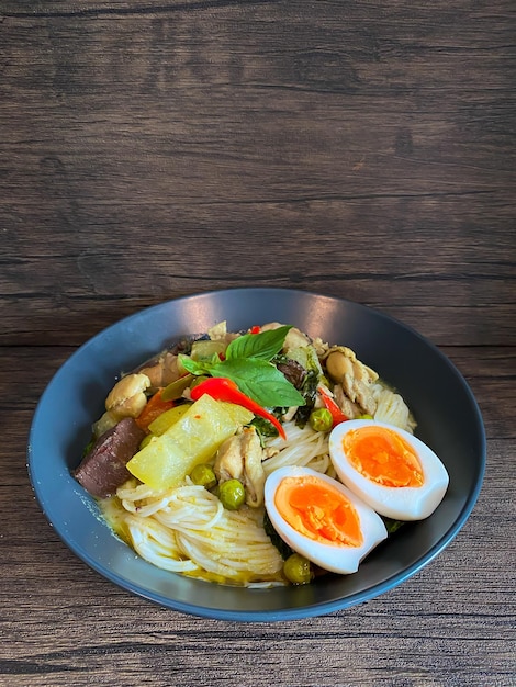 Thai food Green curry chicken on the table