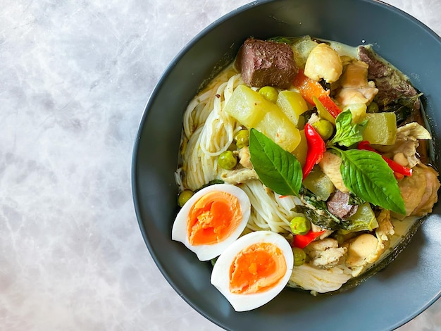 Thai food Green curry chicken on the table