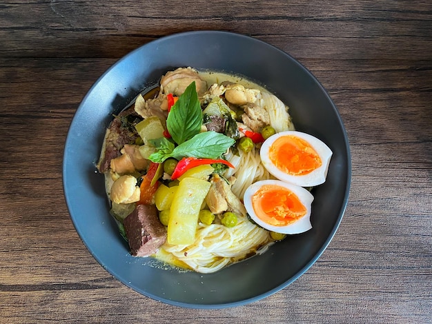 Thai food Green curry chicken on the table