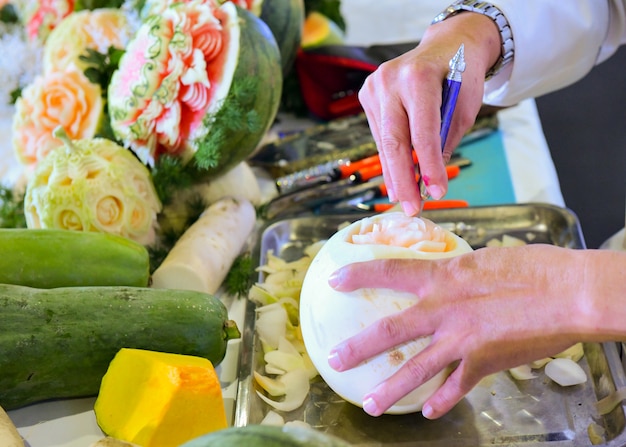 Thai fruit carving with hand, Vegetable and Fruit Carving