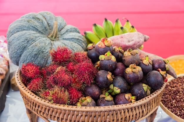 Photo thai fruits mixes mangosteen, lanzones and lambutan.