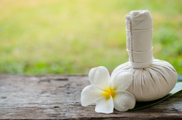 Thai herbal compress for spa and a flower