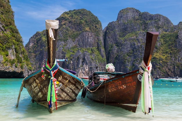 Thai longtail boats on a sea surface. Island Ko Phi Phi Le.