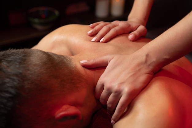 Thai massage in a massage parlor relaxing neck massage in the massage parlor