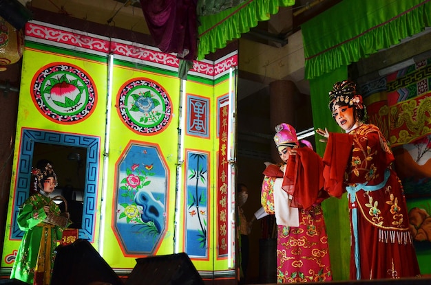 Thai people of chinese descent acting playing present traditional chinese contemporary classical opera for show local people in happy new years festival at city on March 13 2011 in Bangkok Thailand