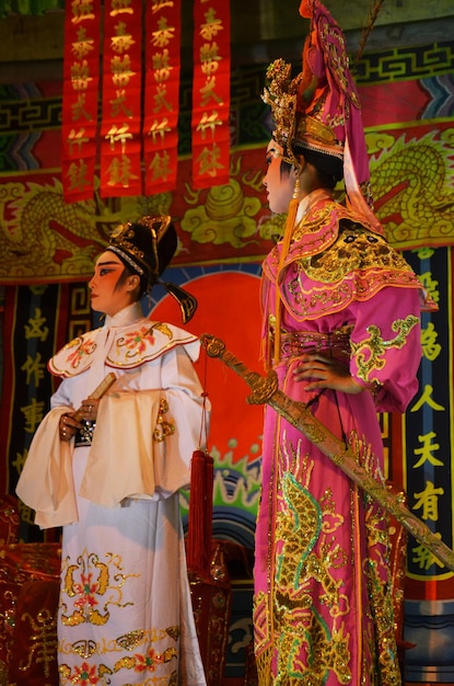 Thai people of chinese descent acting playing present traditional chinese contemporary classical opera for show local people in happy new years festival at city on March 13 2011 in Bangkok Thailand