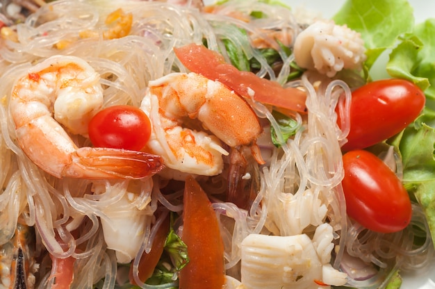 Thai spicy salad with noodle glass and shrimp