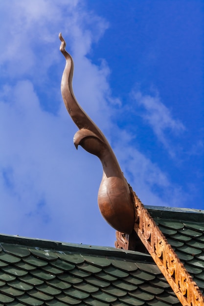 Thai style gable apex in blue sky