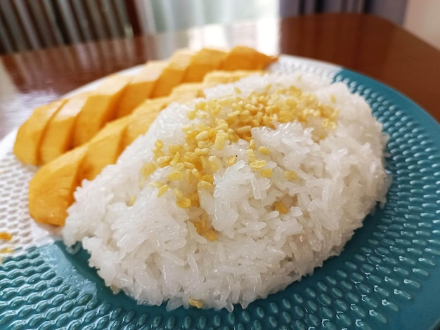 Thai Sweet Sticky Rice with Mango Thai Dessert or Khao Niew Ma Muang close up