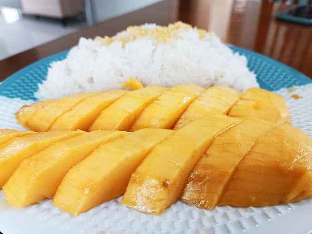 Thai Sweet Sticky Rice with Mango Thai Dessert or Khao Niew Ma Muang close up