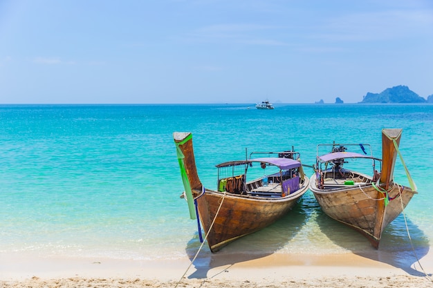 Thailand Andaman Sea Travel with Long tail boats on Tropical beach Summer Holiday