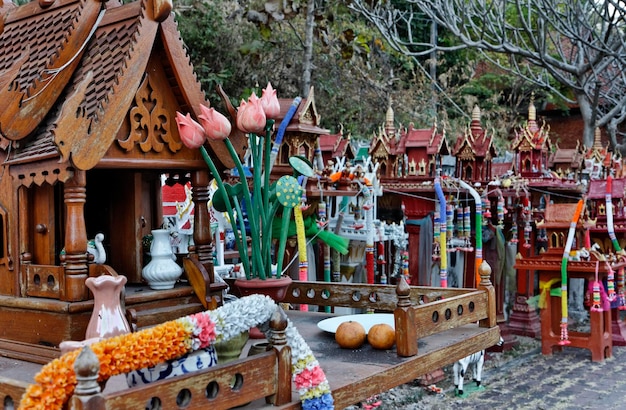 Thailand, Ayutthaya, these votive miniature temples are left in this sacred place by Thai people in memory of their dead relatives