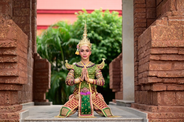 Thailand Dancing in masked Khon performances with ancient temple