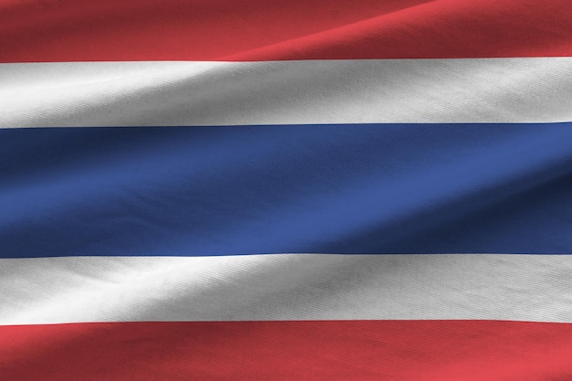 Thailand flag with big folds waving close up under the studio light indoors The official symbols and colors in banner