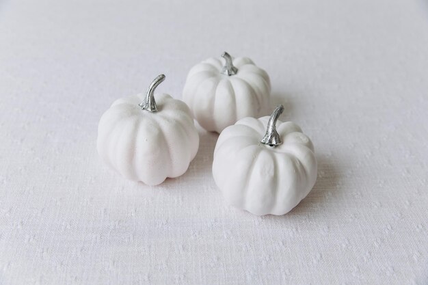 Thanksgiving set Three pumpkins on the table for Thanksgiving mockup