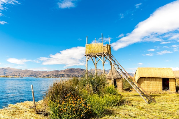 Thatched tower on Floating Islands on Lake Titicaca Puno Peru South America