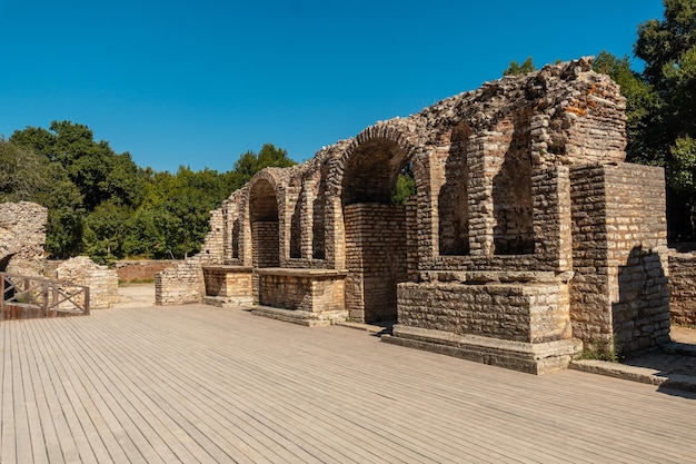 Theater and amphitheater in the archaeological ruins of Butrint or Butrinto National Park in Albania