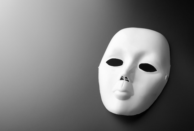 Theater mask on grey