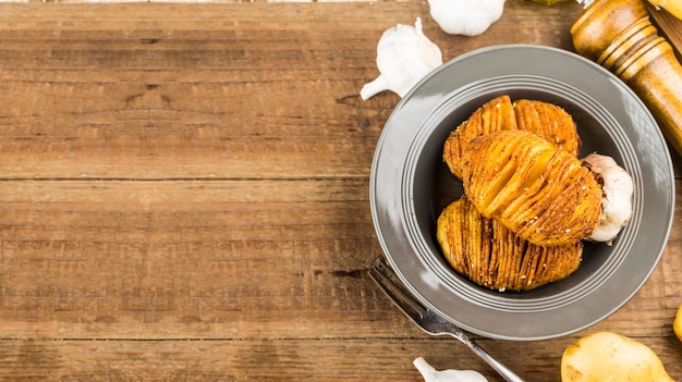 There are delicious baked potatoes on the plate