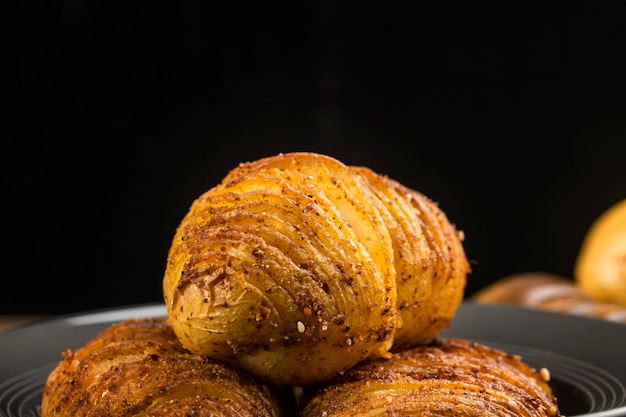 There are delicious baked potatoes on the plate