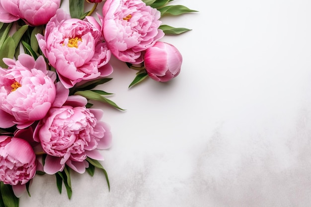 There are pink flowers on a white surface with green leaves generative ai