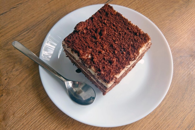 There is a plate of cake on the table Sweets with tea or coffee