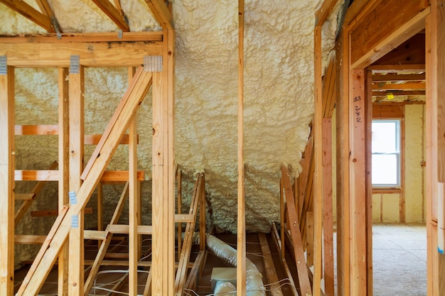 Thermal and hidro insulation inside wall insulation in wooden house building under construction