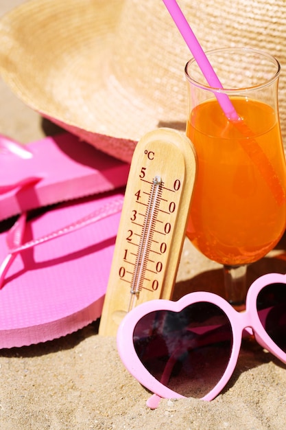 Photo thermometer in sand closeup