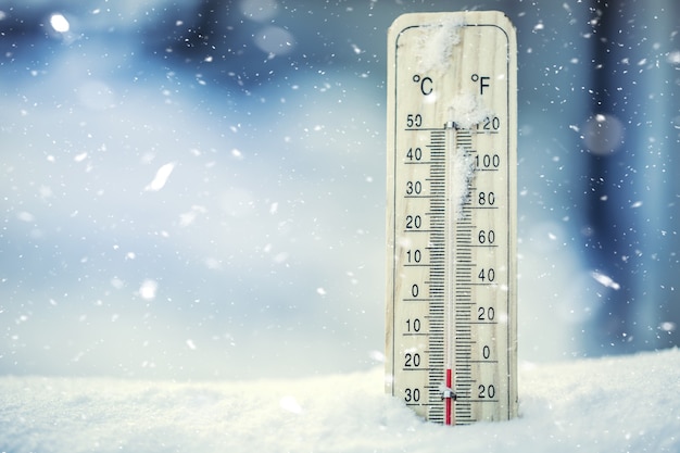 Thermometer shows low temperatures under zero Low temperatures in degrees Celsius and fahrenheit