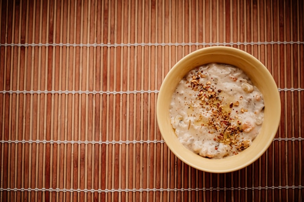 Thick cream soup with mushrooms and spices for healthy diet, food delivery service and order online concept