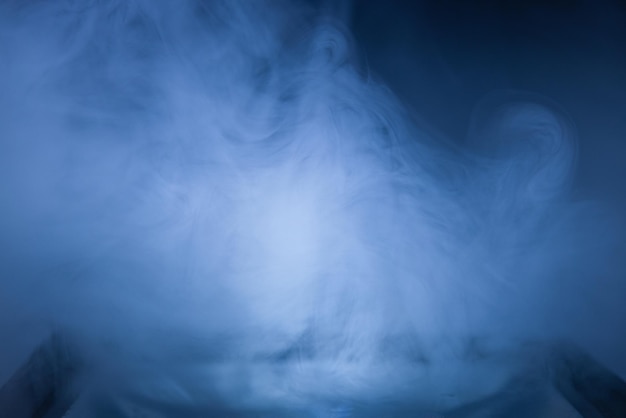 Thick white smoke on a black background