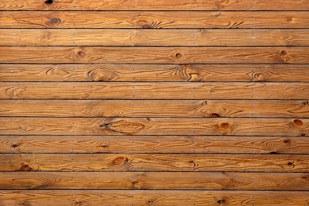 Thin brown wooden planks texture background.