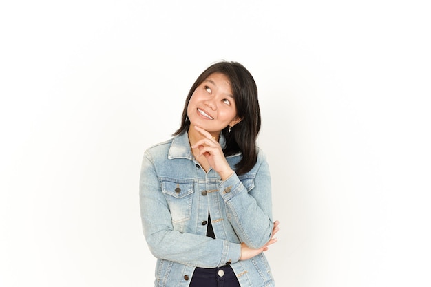 Thinking of Beautiful Asian Woman Wearing Jeans Jacket and black shirt Isolated On White Background