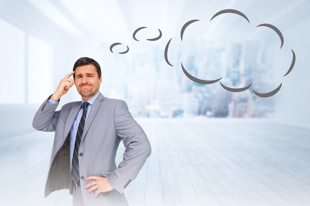 Thinking businessman with speech bubble against city scene in a room