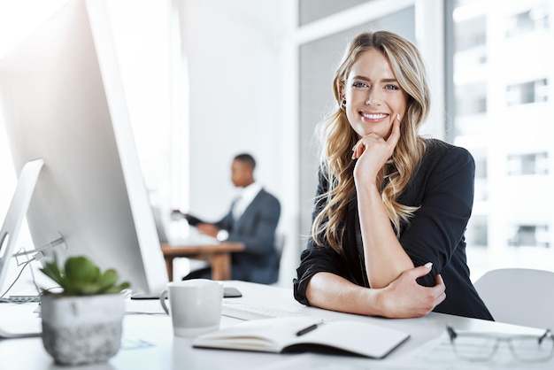 Thinking portrait and woman with smile computer and happy with research online and journalist on desk Company digital and reporter with notebook for editing of story for blog news and office