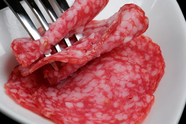 Thinly sliced delicious fragrant salami