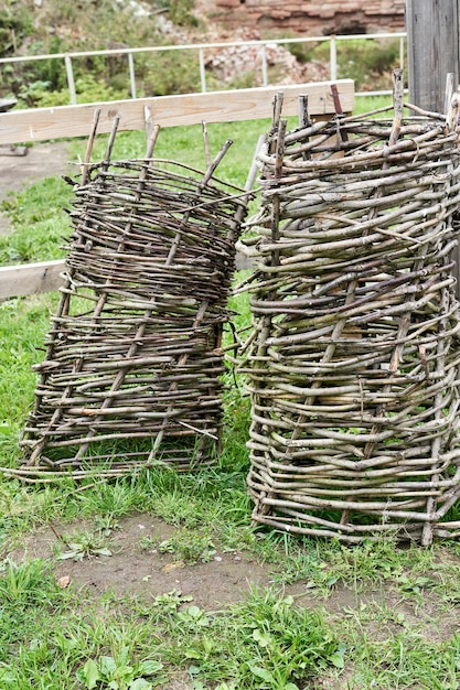 This high handmade basket is woven of tree branches