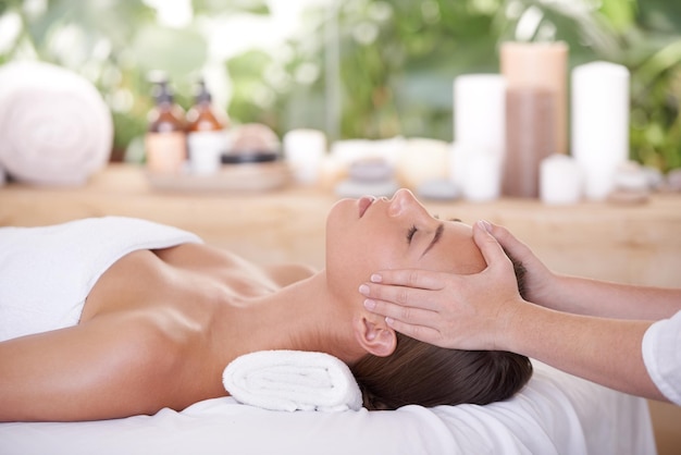 This is perfect relaxation A young woman on a massage table in a spa