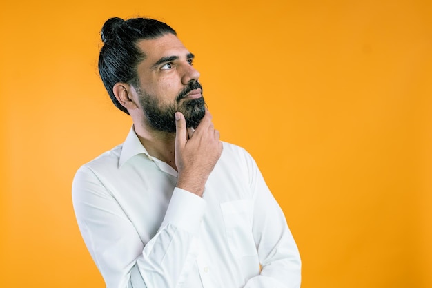 Thoughtful businessman with background