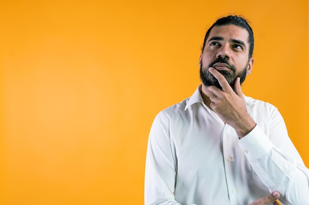 Thoughtful businessman with background