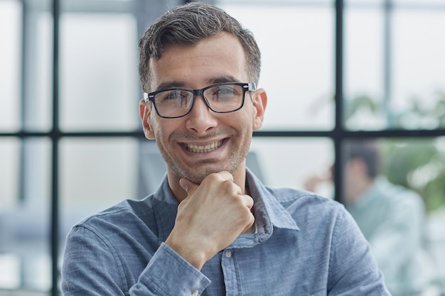 Thoughtful male employee pondering considering idea