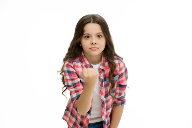 Threatening violence Stop bullying movement Girl kid threatening with fist Strong personality temper Threaten with physical attack Kids aggression concept Aggressive girl threatening to beat