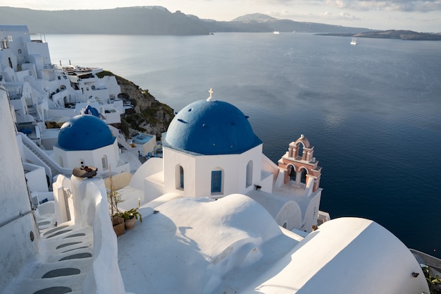 Three Blue Domes church Santorini Oia village in Santorini island, Greece.