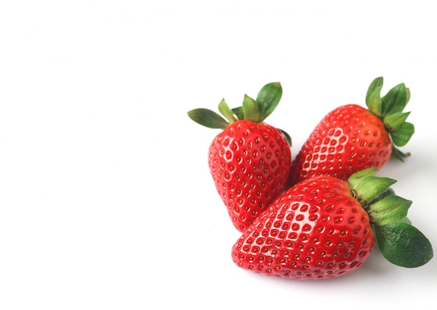 Three Bright Color Red Fresh Ripe Strawberries Isolated on White Background with Free Spac