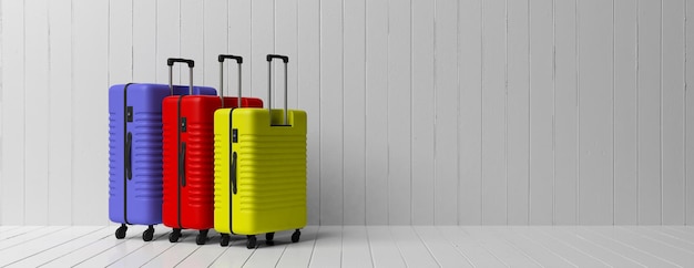 Three bright colors and various sizes suitcases isolated on white wooden floor and wall background banner copy space 3d illustration