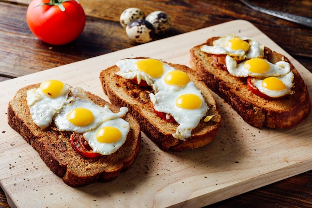 Three Bruschettas with Fried Quail Eggs