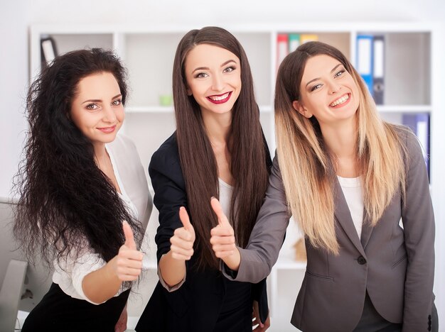 Three businesswomen working together