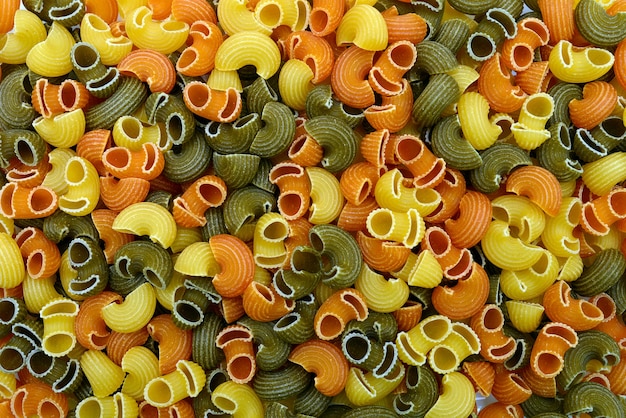 Three color elbow pasta texture food pattern